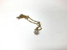 An 18ct diamond pendant and chain. Approx weight 7