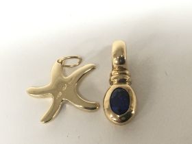 An 18carat gold pendant set with a sapphire weight