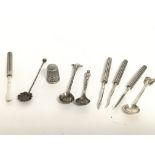 A collection of silver salt spoons, manicure set a