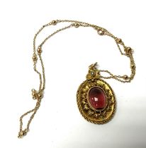 An yellow metal Edwardian cabochone Garnet and see