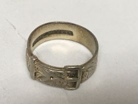 A Vintage silver buckle ring marked sterling silve