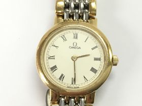 A ladies Omega DeVille wristwatch with box and som