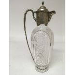 A silver and cut glass claret jug with London hall