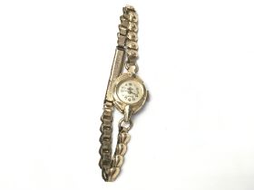 A vintage ladies rolled gold wristwatch. 11.93g. N