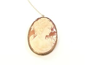 A 9ct gold cameo brooch. 12.7g total. Postage B