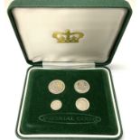 A cased 4 coin silver Maundy set, re-issued 1936.