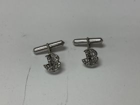 A pair of 14ct (tested) white gold initial diamond