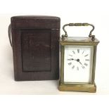 A cased French 8 Day brass Carriage clock with lev