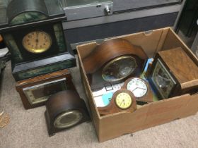 A box of vintage mantle clocks. Shipping category