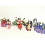 A collection of Royal Doulton porcelain figurines