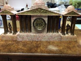A Victorian pink marble clock set of classical for