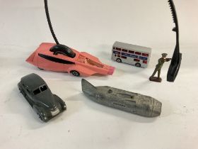 Assorted vintage die cast and other toys including