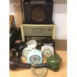 A collection of bakelite items comprising radios,