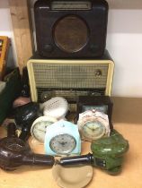 A collection of bakelite items comprising radios,