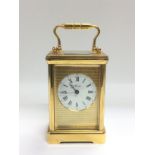 An Asprey laqcuered brass mantle clock, approx hei