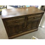A Quality Ercol cabinet the rectangular top above