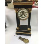 An ebonised four pillar eight day mantle clock, ap