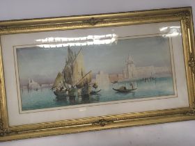A gilt framed watercolour study of Venice with tra
