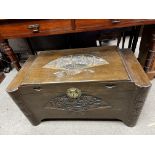 An Oriental Carved camphor chest.- NO RESERVE