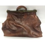 A Pierre Cardin leather holdall, a Visconti leathe