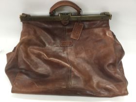 A Pierre Cardin leather holdall, a Visconti leathe