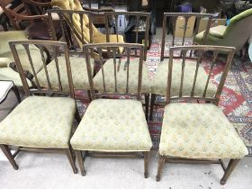 A set of 6 late George III mahogany dining chairs.