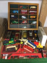 Two boxes of die cast vehicles, mostly boxed Model