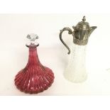 Fluted bell shaped cranberry decanter and a glass