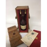 An empty bottle of Martell silver jubilee Cognac b