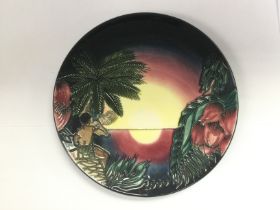 A boxed limited edition Moorcroft circular dish of