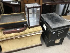 Two metal deed boxes together with four miniature display cabinets