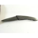 A Damascus steel folding knife with leather sheaf