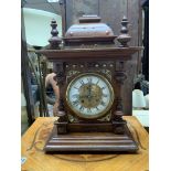 A vintage mantle clock with pressed dial. (D)