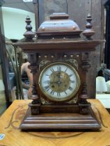 A vintage mantle clock with pressed dial. (D)