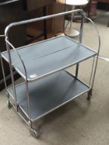 A mid 20th century modern design folding chrome te