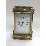 A brass cased carriage clock. Shipping category D.