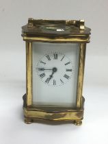 A brass cased carriage clock. Shipping category D.