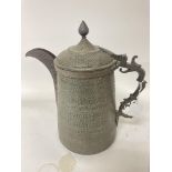 A large 19th Century Islamic copper water jug with