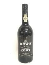 An unopened bottle of Dows 1975 Vintage Port bottl