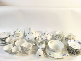 A collection of part tea sets including Queen Anne
