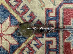 A modern design sword stick with polished crystal ball within a claw grip. (D)