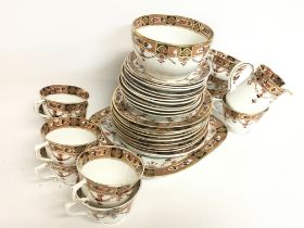 Royal Stafford tea set including plates, cups etc.