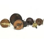 A collection of vintage Bakelite and wooden fly fi