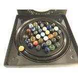 Models solitaire Di Venezia game with hand blown marbles and wooden board. Postage C.