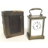 A cased French 8 Day Brass Carriage clock, with tu