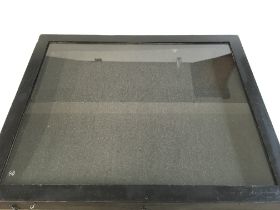 A glass topped display case. 32 x 26 x 3.5 inches.