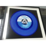 A limited Edition framed rock and roll denim vinyl