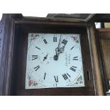 A oak long case clock the enamel painted dial with