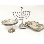 A silver plated Jewish Menorah a modern design gla