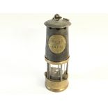 A miners lamp by protector lamp and lighting co ltd. Model GR6S deputies safety lamp. Postage B